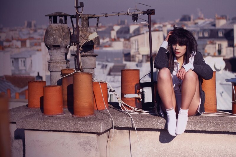 Woman on a rooftop in Paris