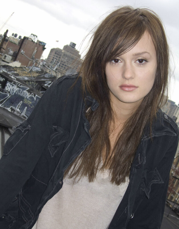 woman on a rooftop in the city