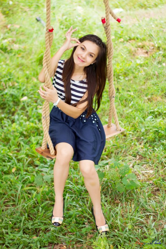Woman on a rope swing