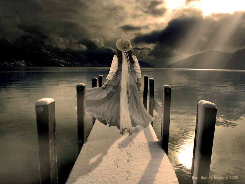 Woman on a snowy dock