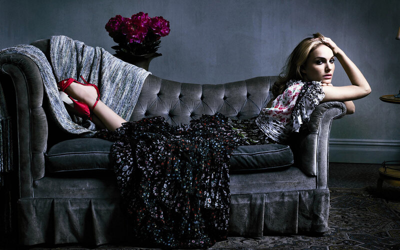woman on a sofa with flowers