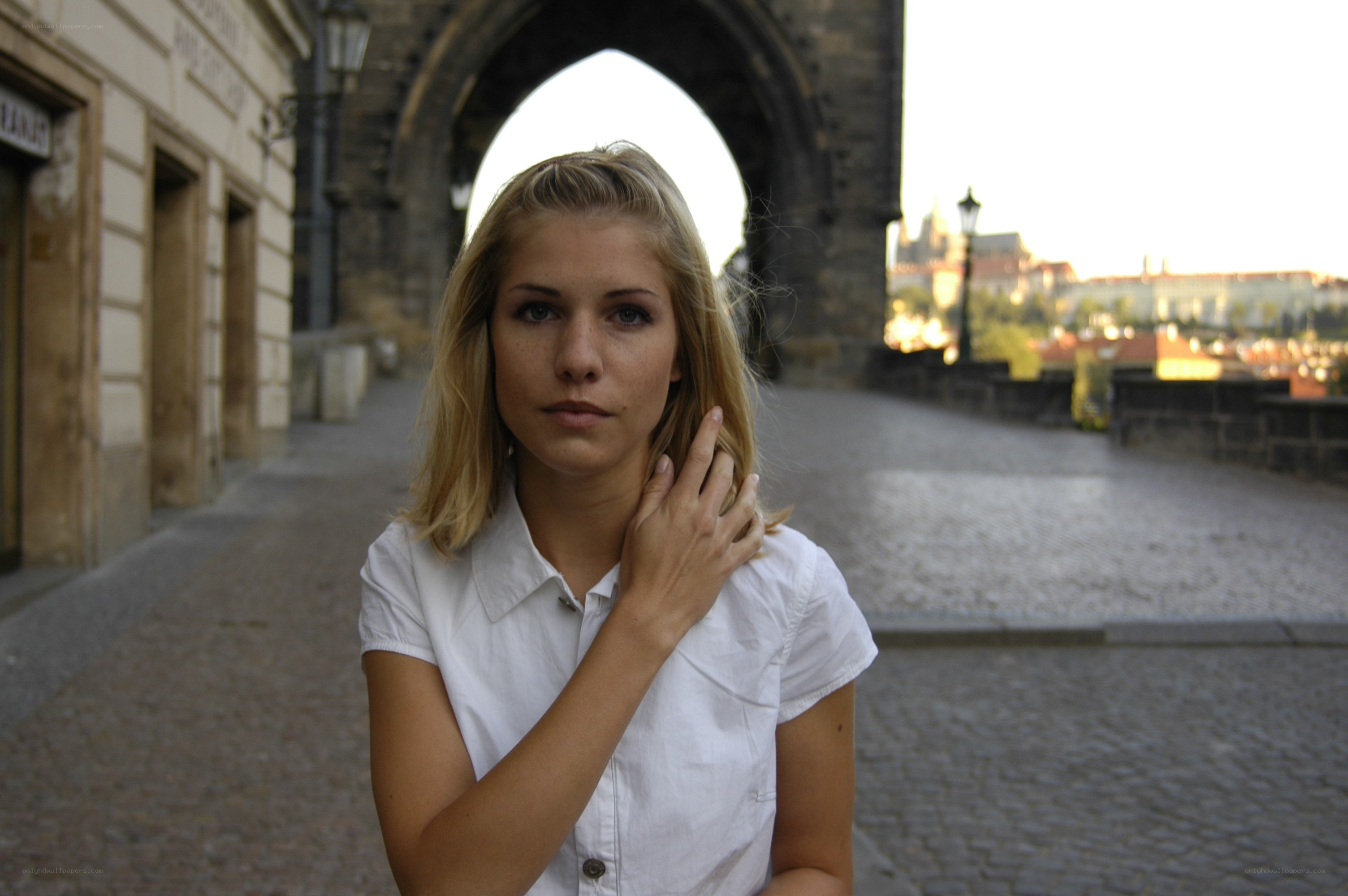 woman on a stone bridge