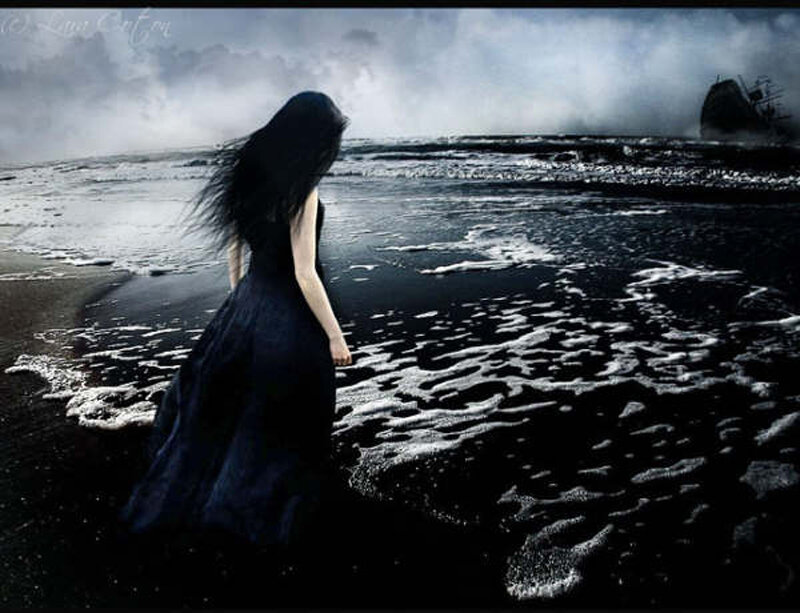 woman on a stormy beach