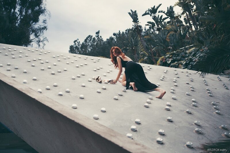 Woman on a studded roof