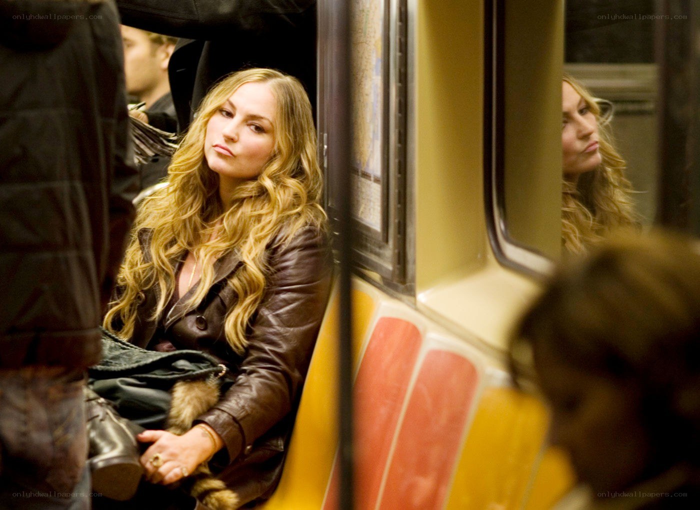 Woman on a subway train
