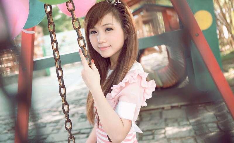 woman on a swing at playground