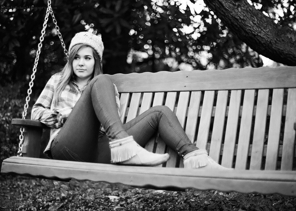 woman on a swing bench