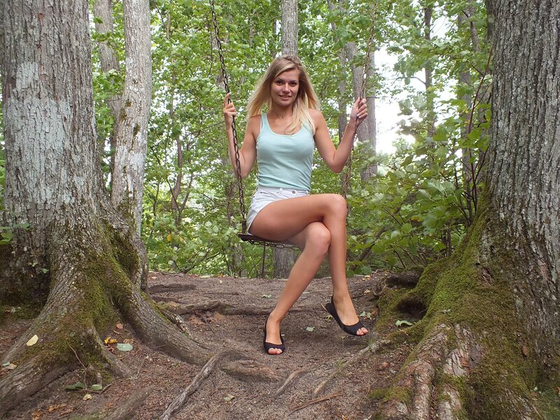 Woman on a Swing — Green, Serene, Summer