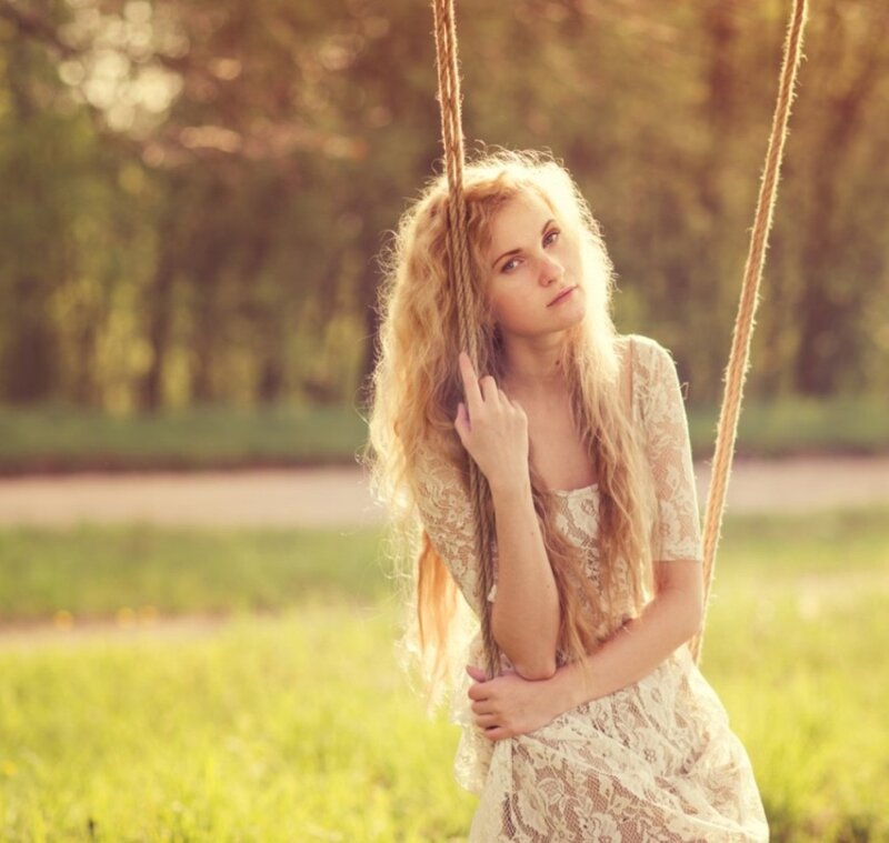 Woman on a Swing — Green, Serene, Sunset