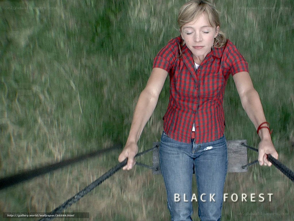 woman on a swing in a field