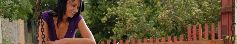 woman on a swing in garden