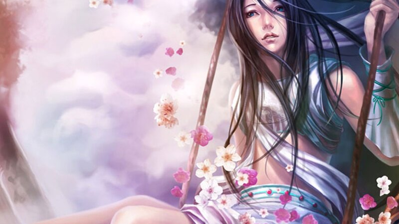 woman on a swing with cherry blossoms