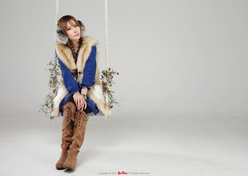 woman on a swing with flowers