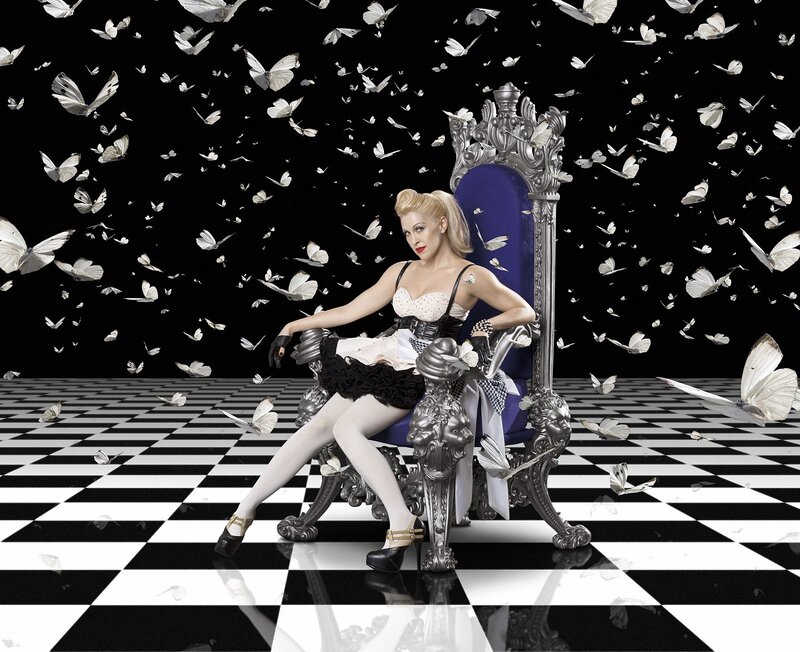 Woman on a throne with butterflies