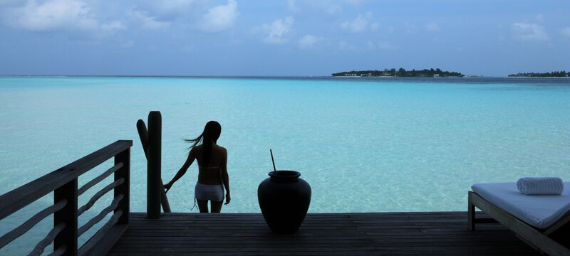 Woman on a tropical deck