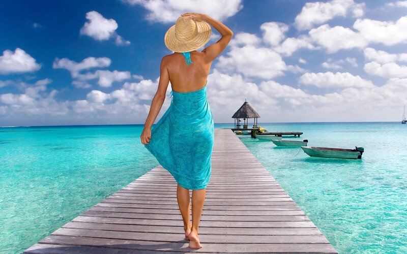 Woman on a tropical dock