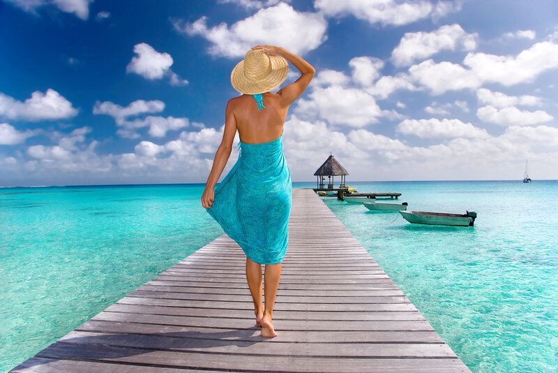 Woman on a tropical dock