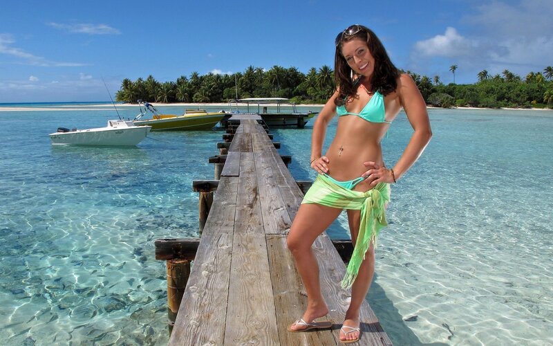 Woman on a tropical dock