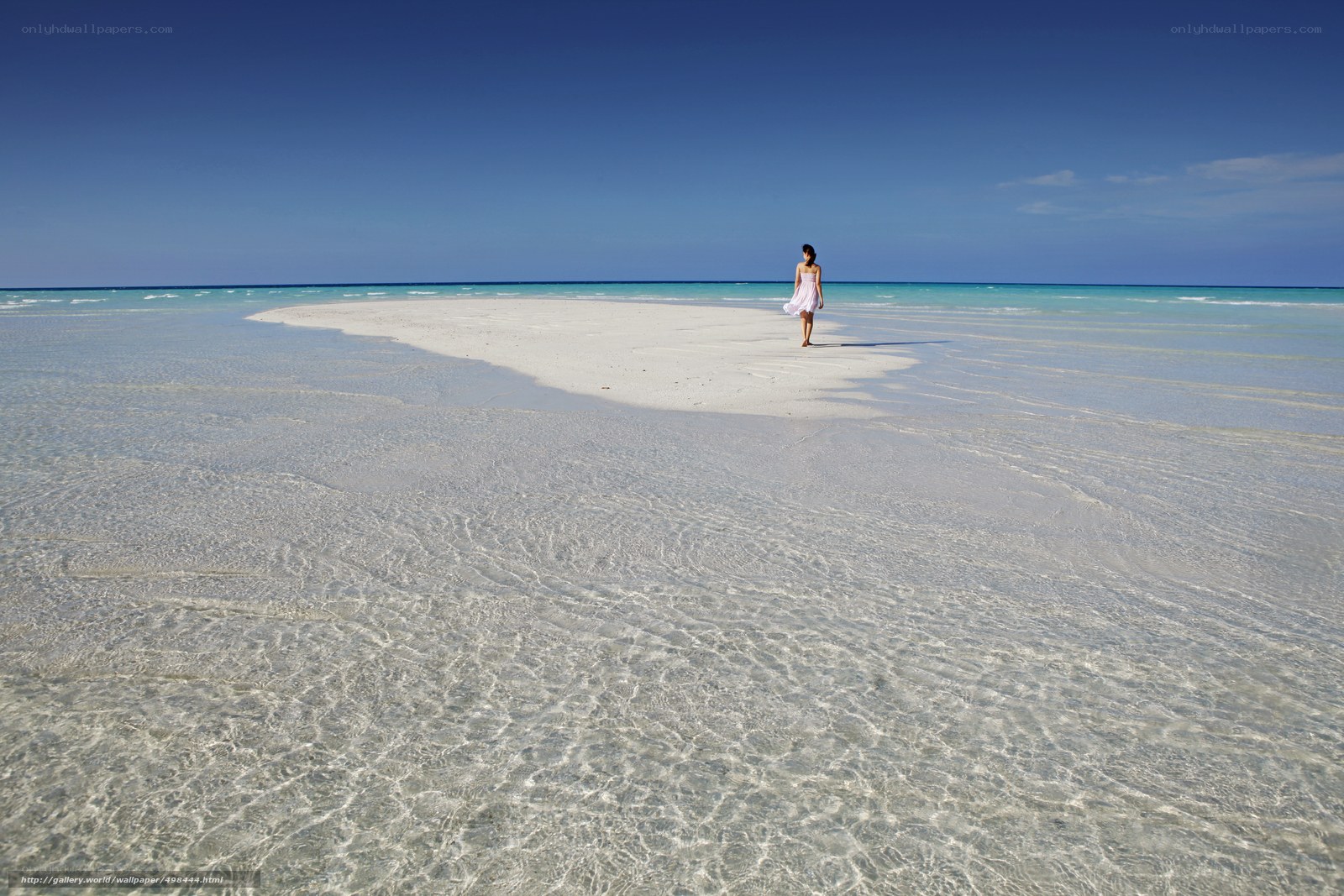 Woman on a tropical sandbar