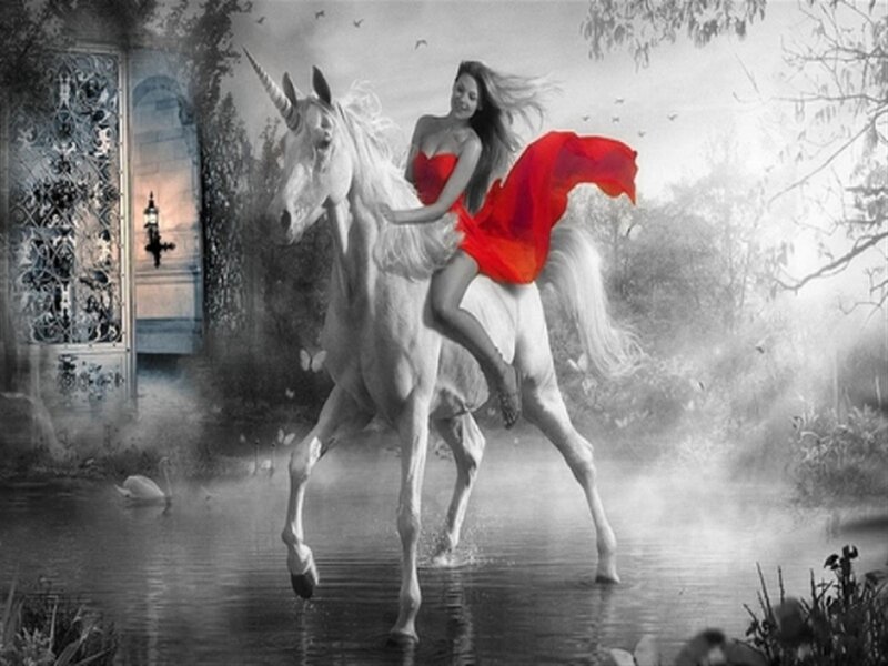 Woman on a unicorn in a fantasy scene