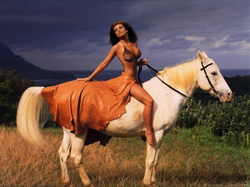 Woman on a white horse