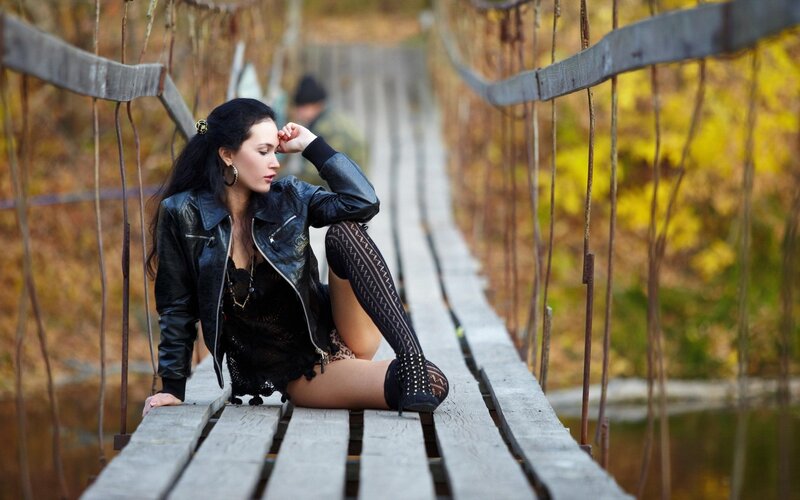 Woman on a wooden bridge