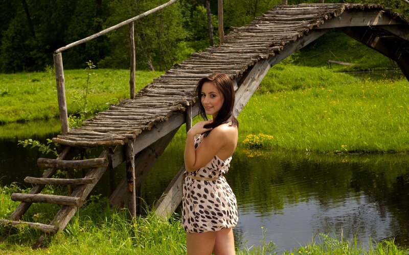 Woman on a wooden bridge