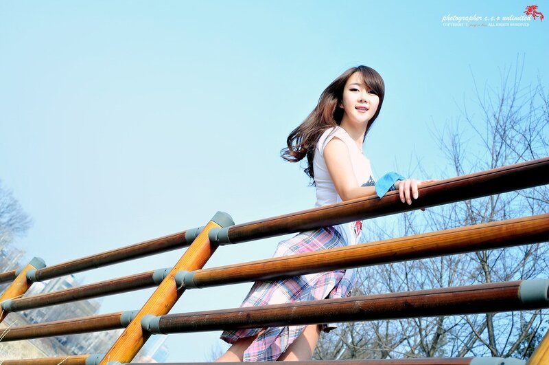 Woman on a wooden bridge