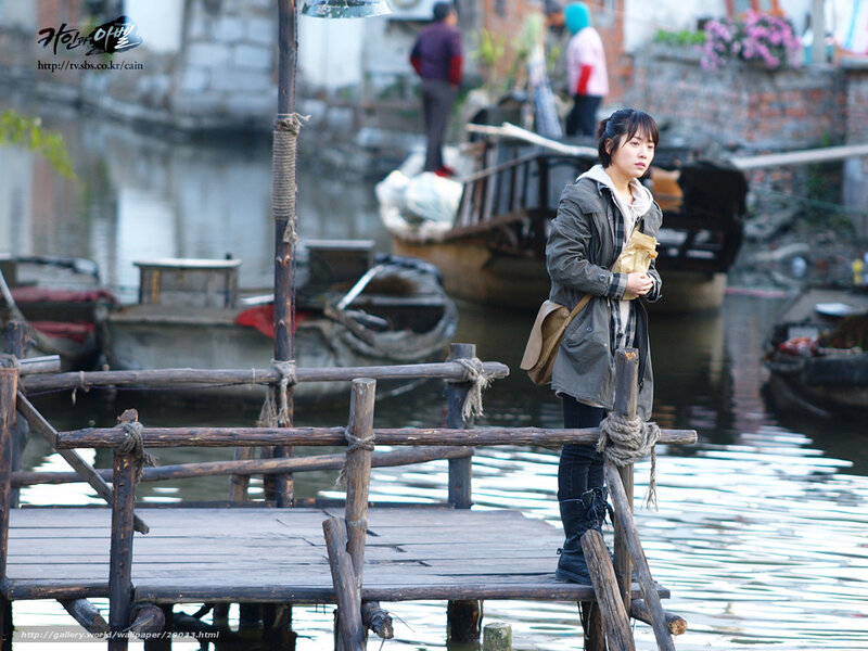 woman on a wooden dock