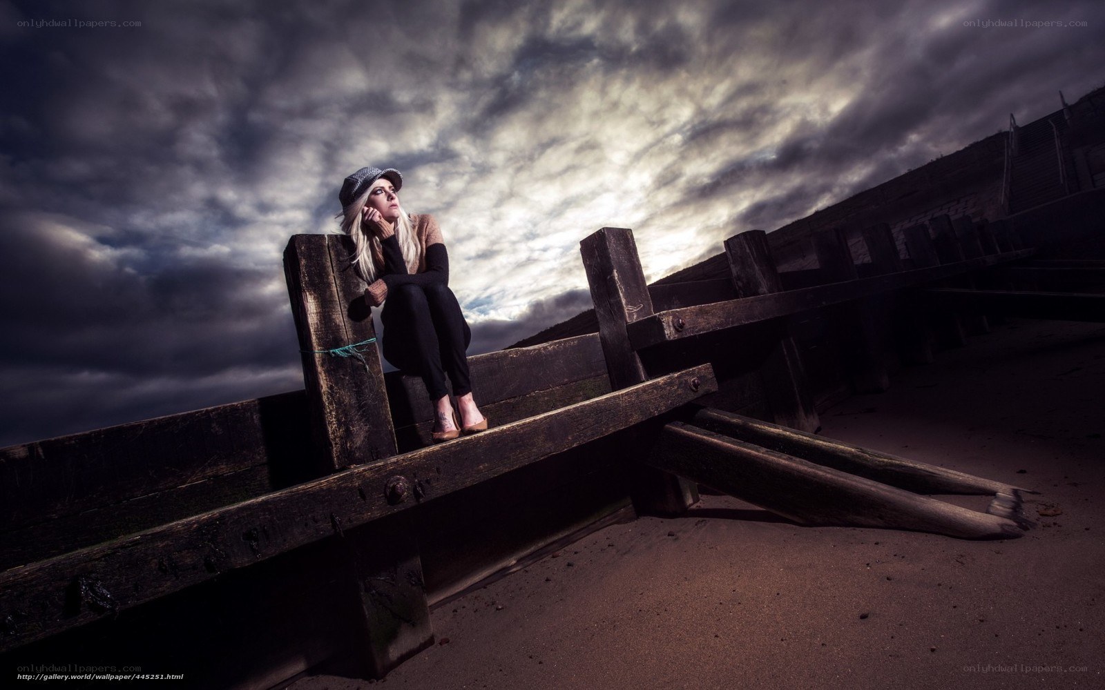 Woman on a wooden structure