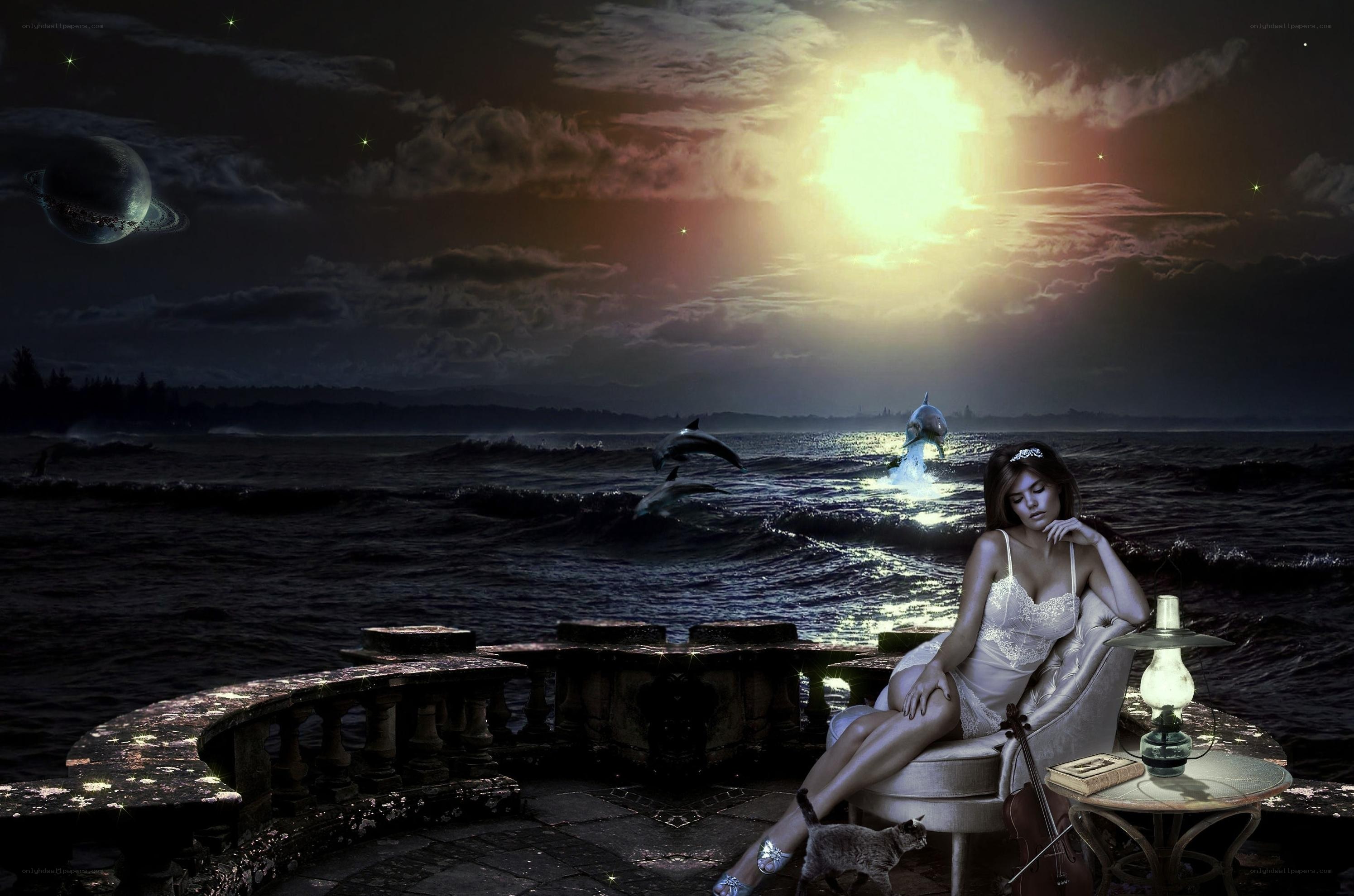 woman on balcony at night