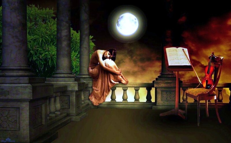 woman on balcony at night
