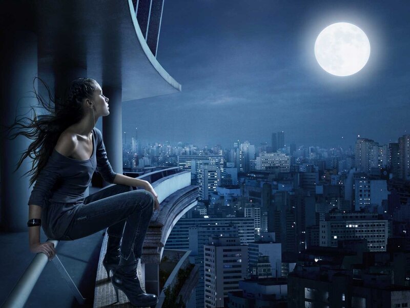 Woman on Balcony at Night — Blue, Dramatic, Photograph