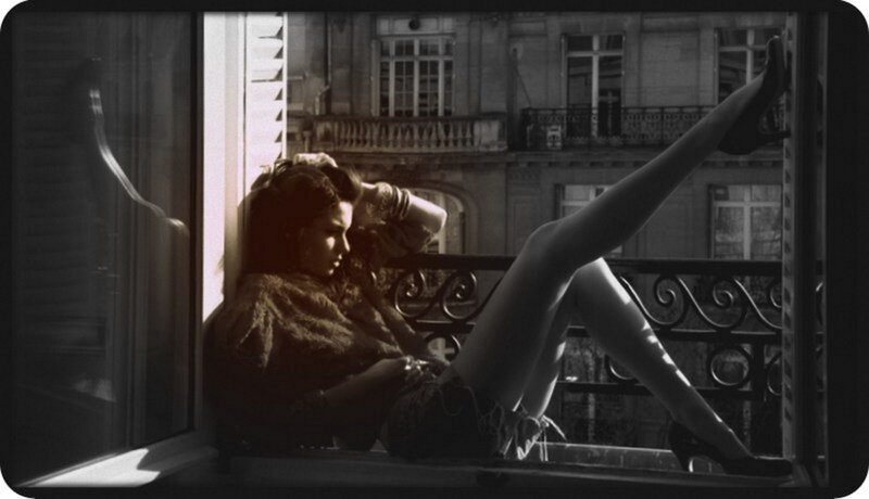 Woman on Balcony — Black, Dramatic, Afternoon