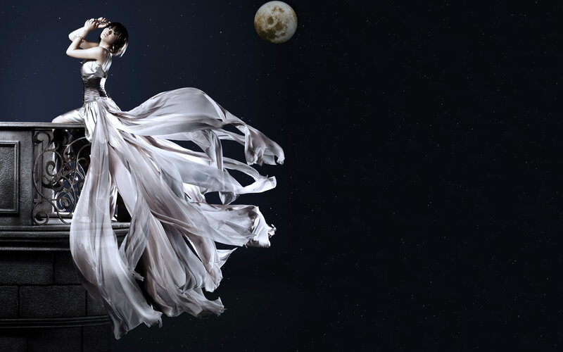 woman on balcony under moon