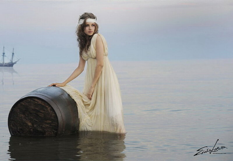 woman on barrel in water