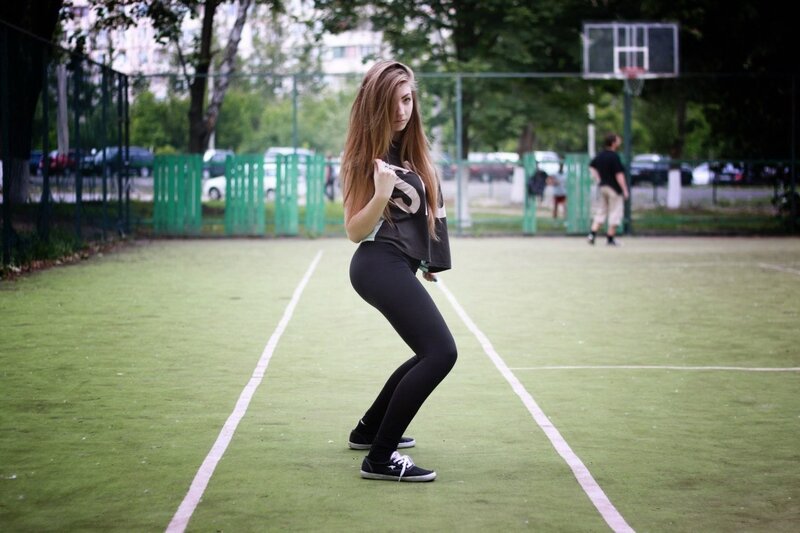 Woman on Basketball Court — Green
