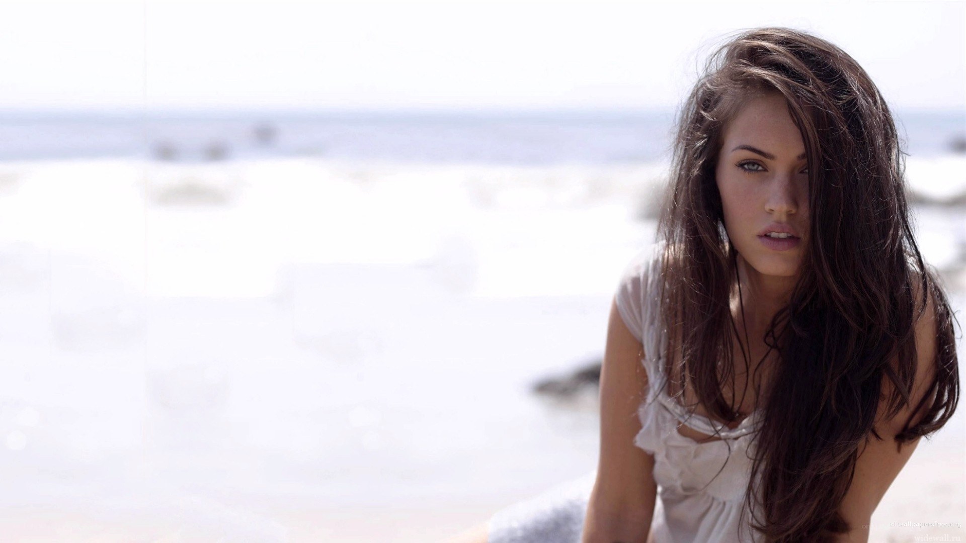 woman on beach at daytime