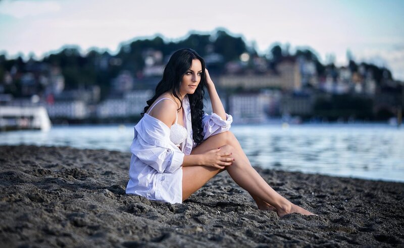 Woman on beach at dusk