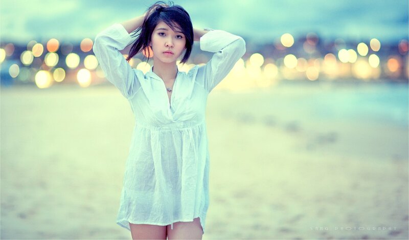 woman on beach at dusk