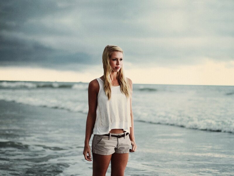 woman on beach at dusk