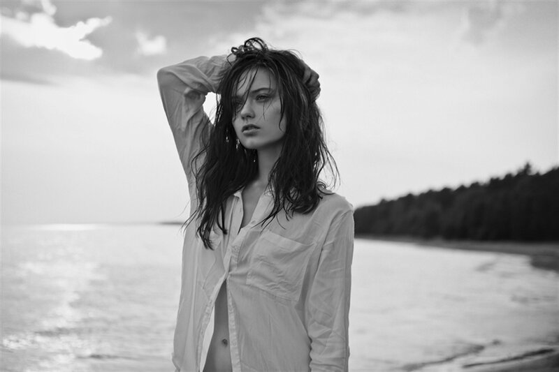Woman on Beach at Dusk — Black, Dramatic
