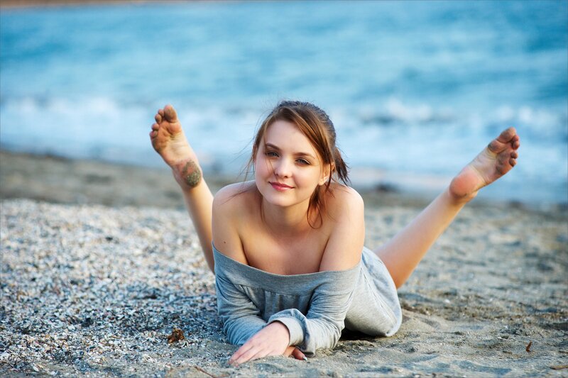 woman on beach at sunset