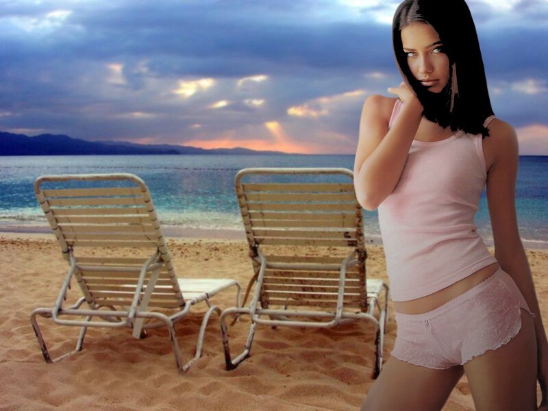 woman on beach at sunset