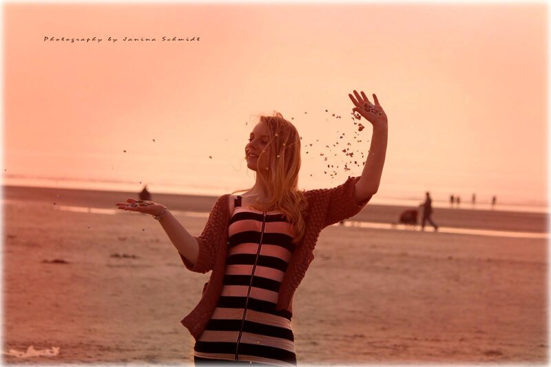 Woman on beach at sunset