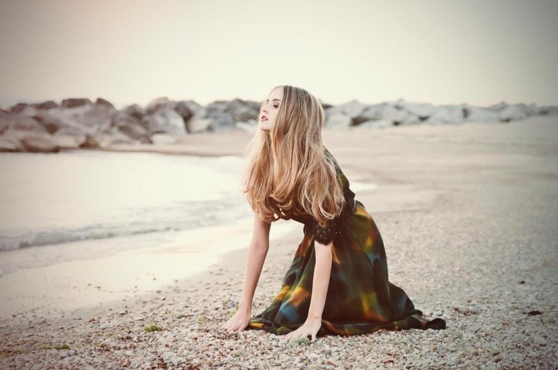 woman on beach at sunset