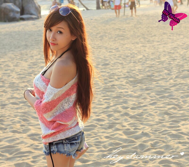 woman on beach at sunset