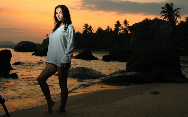 woman on beach at sunset
