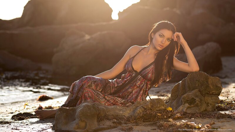 woman on beach at sunset