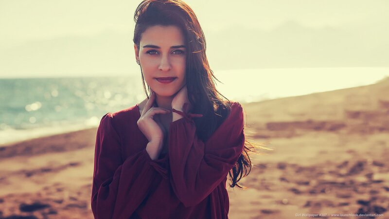 woman on beach at sunset